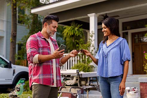 Service provider accepting payment at customer's home