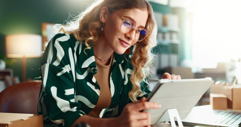 Woman looking at tablet computer
